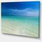 Designart - Turquoise Ocean Under Blue Sky - Modern Seascape Canvas Artwork